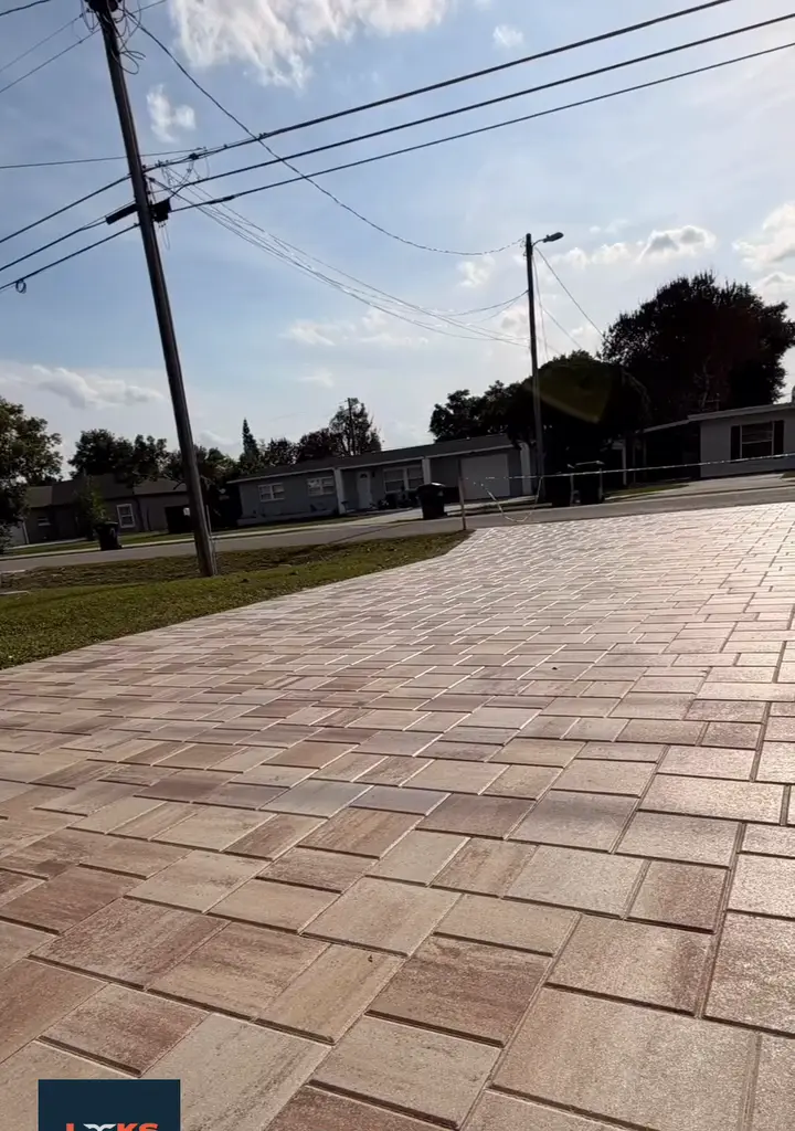 Crew installing a new paver driveway at a home in Orlando, Florida